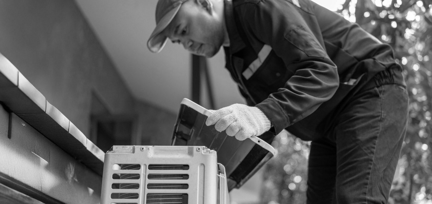 HVAC Tech installing heat pump cap